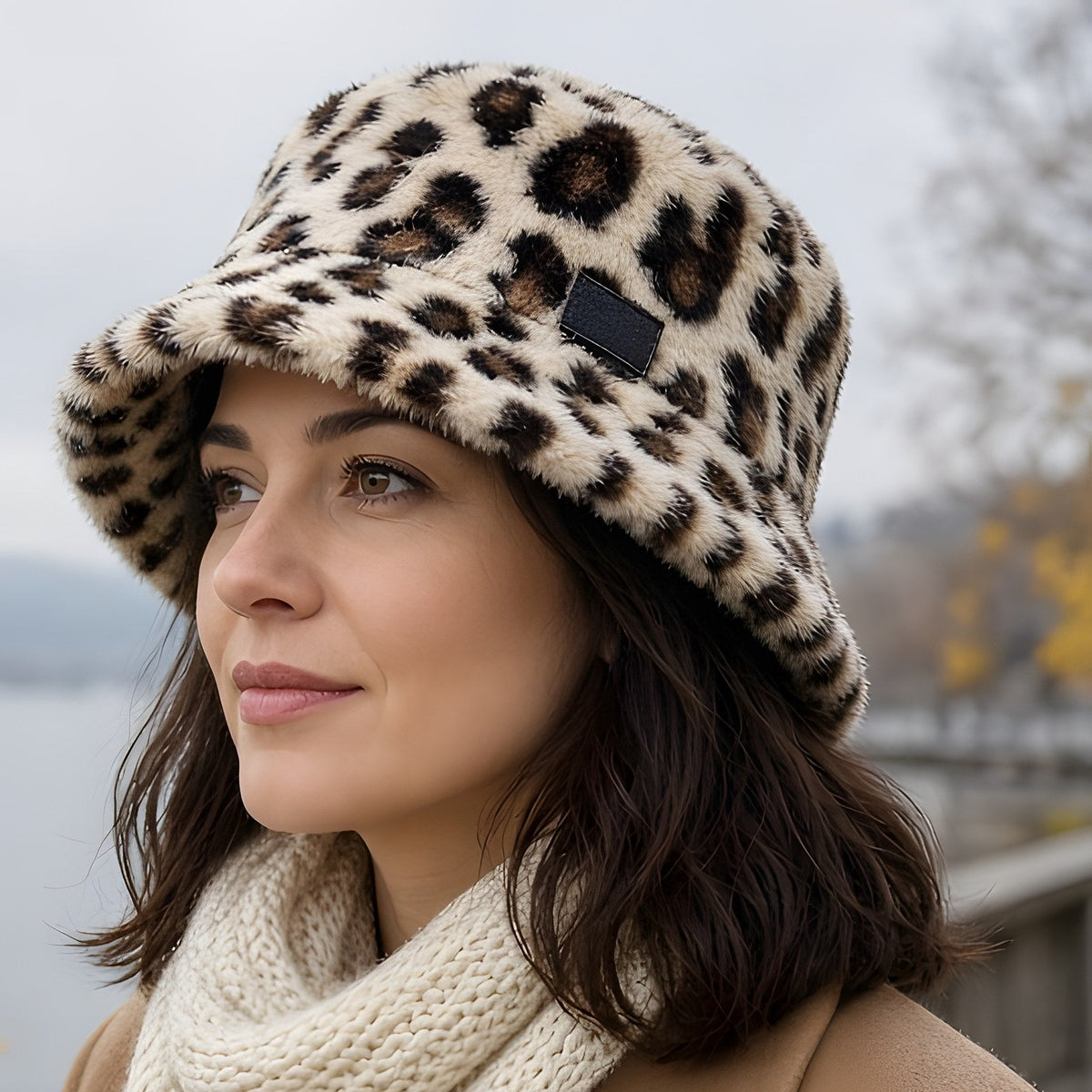 Woman wearing the leopard faux-fur bucket hat on the Lake Zurich promenade